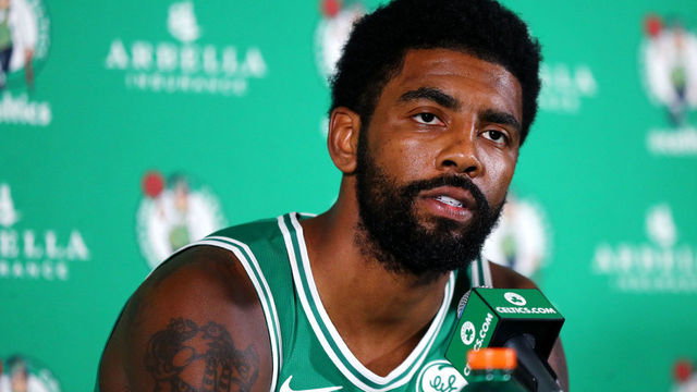 CANTON, MA - SEPTEMBER 24: Kyrie Irving #11 answers questions during a press conference on Boston Celtics Media Day on September 24, 2018 in Canton, Massachusetts. NOTE TO USER: User expressly acknowledges and agrees that, by downloading and/or using this photograph, user is consenting to the terms and conditions of the Getty Images License Agreement.