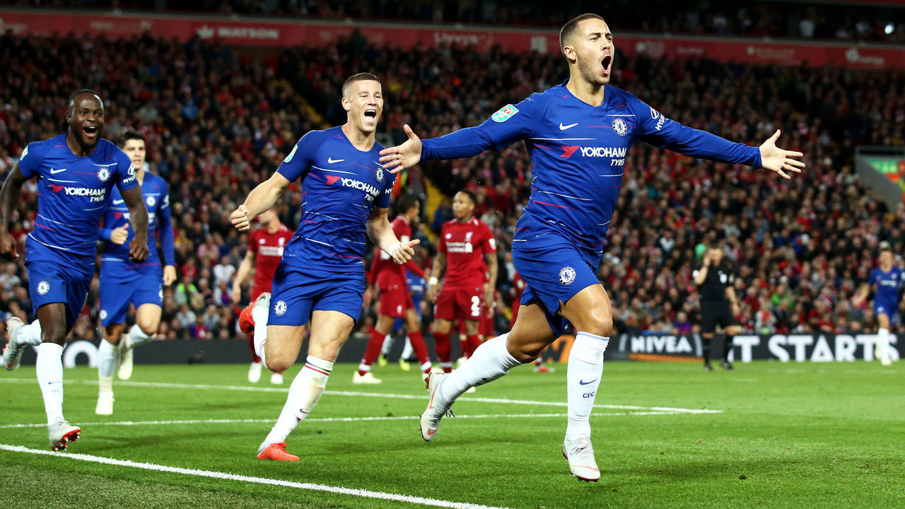 LIVERPOOL, ENGLAND - SEPTEMBER 26: Eden Hazard of Chelsea celebrates after he scores his sides second goal during the Carabao Cup Third Round match between Liverpool and Chelsea at Anfield on September 26, 2018 in Liverpool, England.
