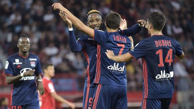 Lyon's Spanish forward Moussa Dembele (C) celebrates with teammates after scoring a goal during the French L1 football match between Dijon (DFCO) and Lyon (OL) on September 26, 2018, at the Gaston Gerard Stadium in Dijon, central-eastern France.