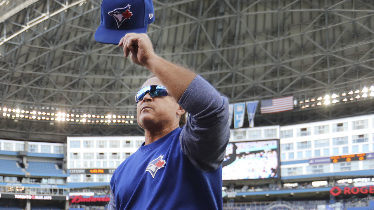 TORONTO, ON - September 26 Prior to the start of the game, Manager John Gibbons gives a tip of his hat to the crowd. The Toronto Blue Jays took on the Houston Astros in the Jays final home game of the season at the Rogers Centre in Toronto. The Astros clinched a playoff spot the night before and it was announced that long time Jays Manager Gibbons will not be back next season. September 26, 2018 (Richard Lautens/Toronto Star via Getty Images)