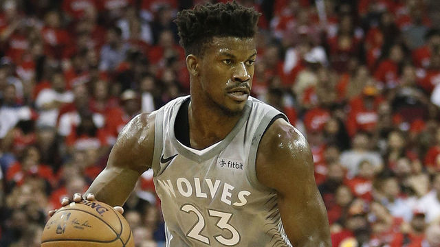 HOUSTON, TX - APRIL 18: Jimmy Butler #23 of the Minnesota Timberwolves brings the ball up court against the Houston Rockets during Game Two of the first round of the Western Conference playoffs at Toyota Center on April 18, 2018 in Houston, Texas.