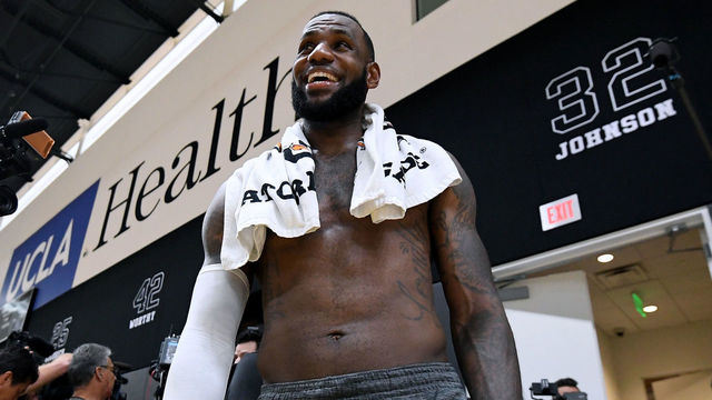 EL SEGUNDO, CA - SEPTEMBER 25: LeBron James of the Los Angeles Lakers laughs as he leaves the court after a Los Angeles Lakers practice session at the UCLA Health Training Center on September 25, 2018 in El Segundo, California.