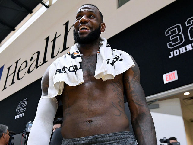 EL SEGUNDO, CA - SEPTEMBER 25: LeBron James of the Los Angeles Lakers laughs as he leaves the court after a Los Angeles Lakers practice session at the UCLA Health Training Center on September 25, 2018 in El Segundo, California.