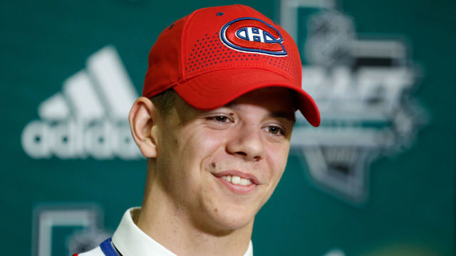 DALLAS, TX - JUNE 22: Jesperi Kotkaniemi answers questions from the media after being selected third overall by the Montreal Canadiens during the first round of the 2018 NHL Draft at American Airlines Center on June 22, 2018 in Dallas, Texas.