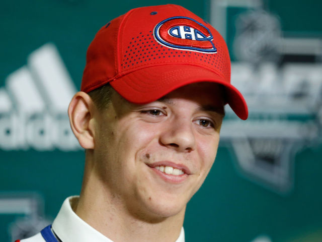 DALLAS, TX - JUNE 22: Jesperi Kotkaniemi answers questions from the media after being selected third overall by the Montreal Canadiens during the first round of the 2018 NHL Draft at American Airlines Center on June 22, 2018 in Dallas, Texas.