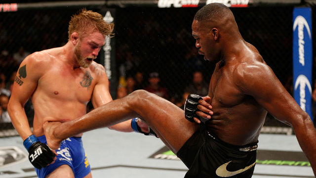 TORONTO, CANADA - SEPTEMBER 21: (R-L) Jon 'Bones' Jones kicks Alexander 'The Mauler' Gustafsson in their UFC light heavyweight championship bout at the Air Canada Center on September 21, 2013 in Toronto, Ontario, Canada.