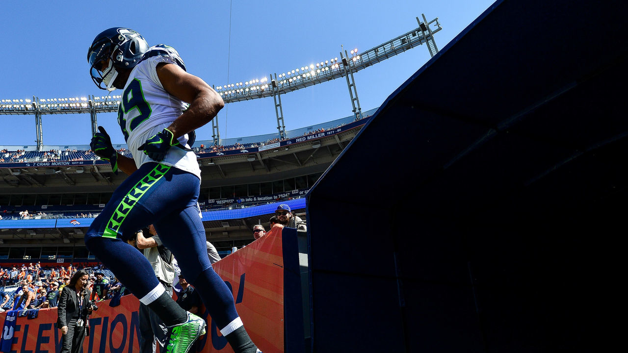 DENVER, CO - SEPTEMBER 9: Wide receiver Doug Baldwin #89 of the Seattle Seahawks runs onto the field before warming up before a game against the Denver Broncos at Broncos Stadium at Mile High on September 9, 2018 in Denver, Colorado.