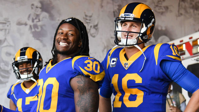 LOS ANGELES, CA - SEPTEMBER 27: Running back Todd Gurley #30 and quarterback Jared Goff #16 of the Los Angeles Rams enter the stadium through the tunnel area of their game against the Minnesota Vikings at Los Angeles Memorial Coliseum on September 27, 2018 in Los Angeles, California.