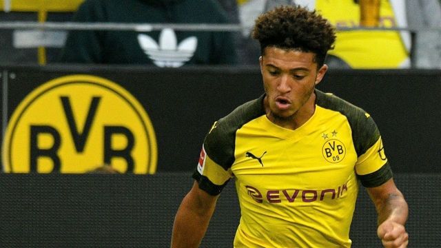 Dortmund's English midfielder Jadon Sancho plays the ball during the German first division Bundesliga football match Borussia Dortmund v RB Leipzig in Dortmund, western Germany, on August 26, 2018.