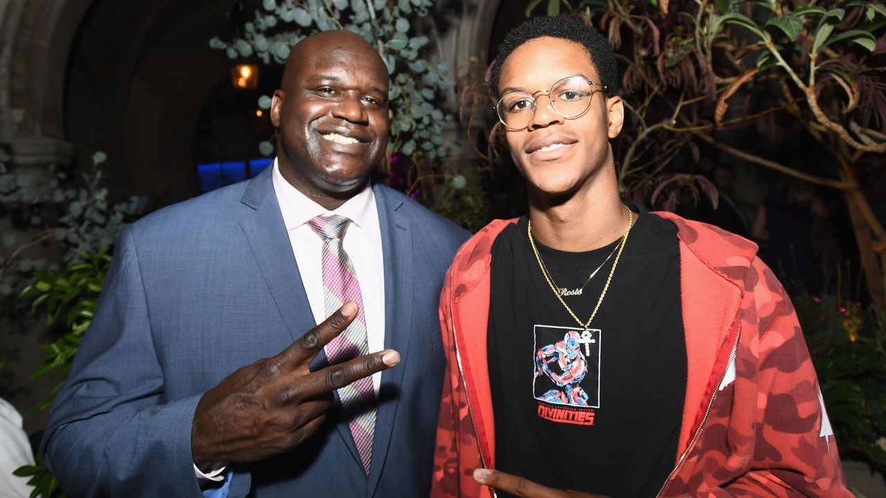 WEST HOLLYWOOD, CA - AUGUST 07: Former NBA player Shaquille O'Neal (L) and son Shareef O'Neal at Apple Music Launch Party Carpool Karaoke: The Series with James Corden on August 7, 2017 in West Hollywood, California.