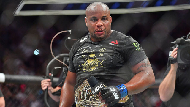 LAS VEGAS, NV - JULY 07: Daniel Cormier addresses the crowd after winning his heavyweight championship fight against Stipe Miocic at T-Mobile Arena on July 7, 2018 in Las Vegas, Nevada. Cormier won by first round knockout.