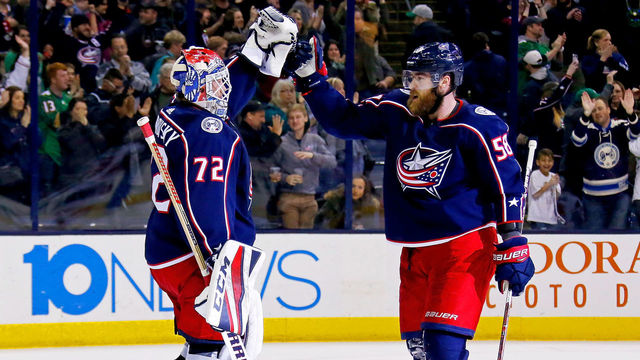 COLUMBUS, OH - MARCH 17: Sergei Bobrovsky #72 of the Columbus Blue Jackets is congratulated by David Savard #58 of the Columbus Blue Jackets after defeating the Ottawa Senators 2-1 on March 17, 2018 at Nationwide Arena in Columbus, Ohio.