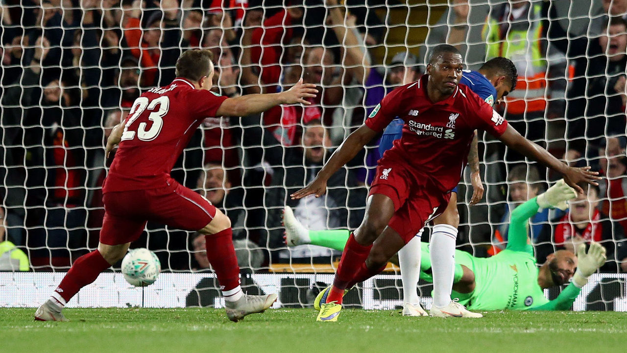 LIVERPOOL, ENGLAND - SEPTEMBER 26: Daniel Sturridge of Liverpool (right) celebrates after he scores his sides first goal during the Carabao Cup Third Round match between Liverpool and Chelsea at Anfield on September 26, 2018 in Liverpool, England.