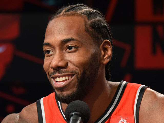 TORONTO, ON - SEPTEMBER 24: Kawhi Leonard #2 of the Toronto Raptors smiles at a press conference after media day on September 24, 2018 at the Air Canada Centre in Toronto, Ontario, Canada. Mandatory Copyright Notice: Copyright 2018 NBAE
