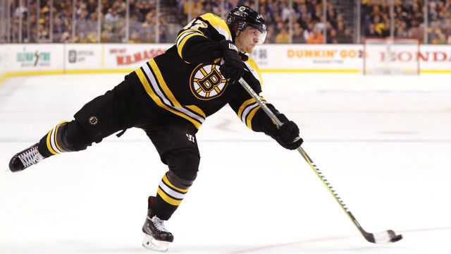 BOSTON, MA - APRIL 21: Torey Krug #47 of the Boston Bruins takes a shot against the Toronto Maple Leafs during the third period of Game Five of the Eastern Conference First Round in the 2018 Stanley Cup play-offs at TD Garden on April 21, 2018 in Boston, Massachusetts. The Leafs defeat the Bruins 4-3.