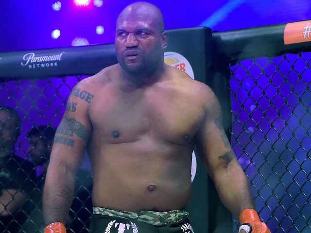 INGLEWOOD, CA - JANUARY 20: Quinton Jackson (red gloves) in the cage as he is introduced for his Heavyweight World Title fight at Bellator 192 against hael Sonnen (not pictured) at The Forum on January 20, 2018 in Inglewood, California.