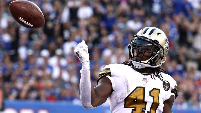 EAST RUTHERFORD, NJ - SEPTEMBER 30: Alvin Kamara #41 of the New Orleans Saints celebrates after scoring a touchdown against the New York Giants during the third quarter at MetLife Stadium on September 30, 2018 in East Rutherford, New Jersey.
