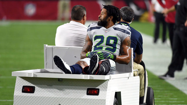GLENDALE, AZ - SEPTEMBER 30: Defensive back Earl Thomas #29 of the Seattle Seahawks leaves the field on a cart after being injured during the fourth quarter against the Arizona Cardinals at State Farm Stadium on September 30, 2018 in Glendale, Arizona.