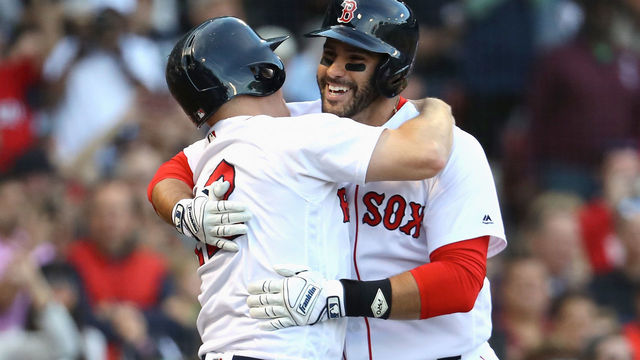 BOSTON, MA - SEPTEMBER 30: J.D. Martinez #28 of the Boston Red Sox celebrates with Brock Holt #12 of the Boston Red Sox after hitting a two RBI home run in the bottom of the fourth inning of the game against the New York Yankees at Fenway Park on September 30, 2018 in Boston, Massachusetts.