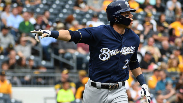 PITTSBURGH, PA - SEPTEMBER 23: Christian Yelich #22 of the Milwaukee Brewers points to the dugout as he rounds the bases on his three-run home run in the second inning during the game against the Pittsburgh Pirates at PNC Park on September 23, 2018 in Pittsburgh, Pennsylvania.
