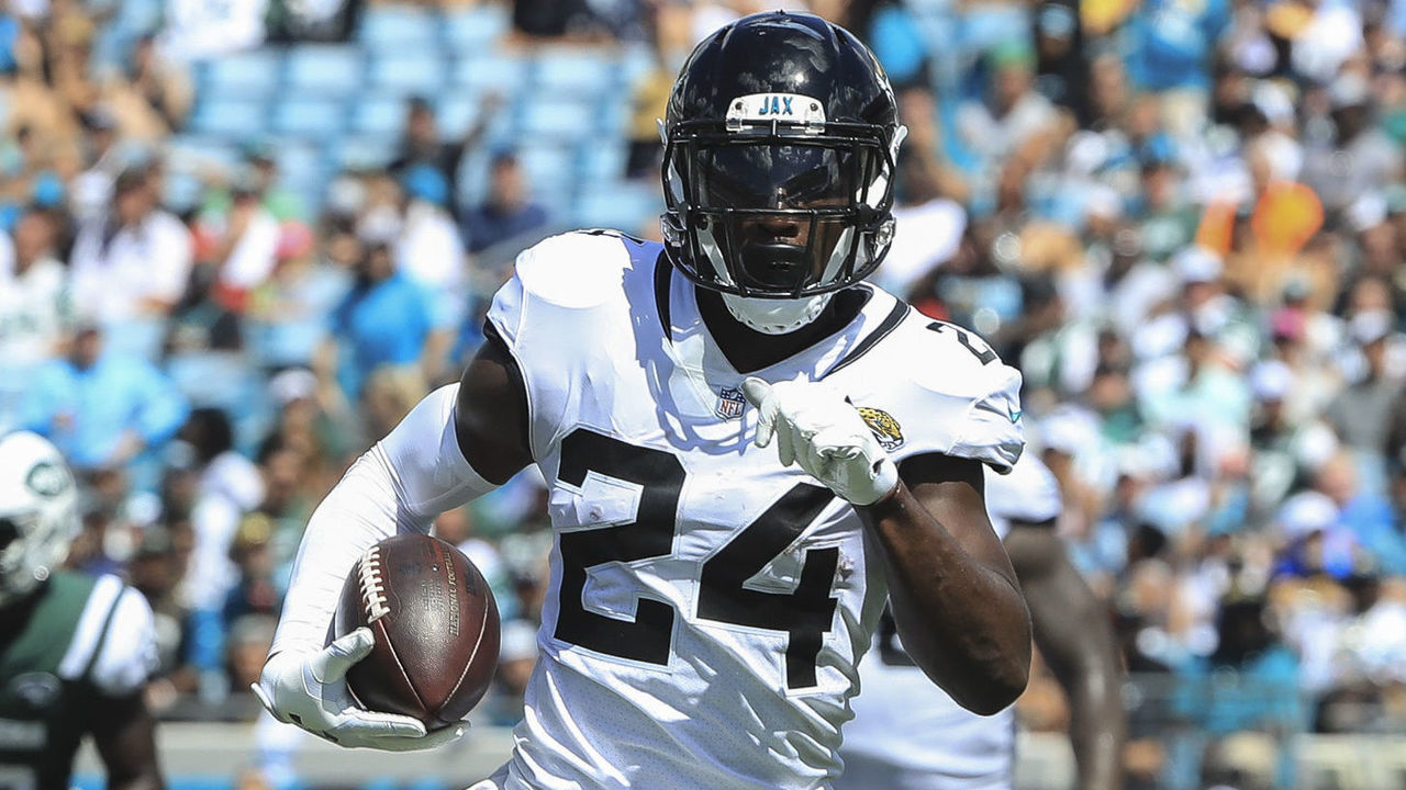 JACKSONVILLE, FL - SEPTEMBER 30: T.J. Yeldon #24 of the Jacksonville Jaguars runs for a touchdown during the first half against the New York Jets at TIAA Bank Field on September 30, 2018 in Jacksonville, Florida.