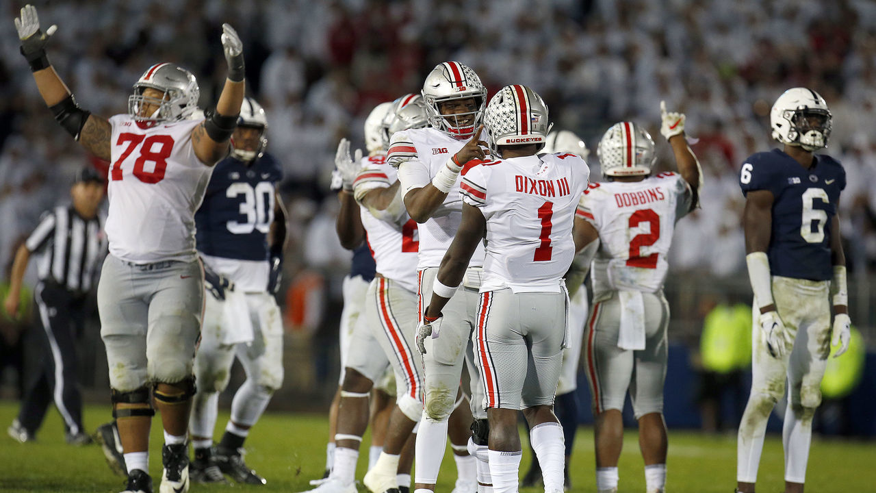 STATE COLLEGE, PA - SEPTEMBER 29: Dwayne Haskins #7 of the Ohio State Buckeyes celebrates with Johnnie Dixon #1 after defeating the Penn State Nittany Lions on September 29, 2018 at Beaver Stadium in State College, Pennsylvania.