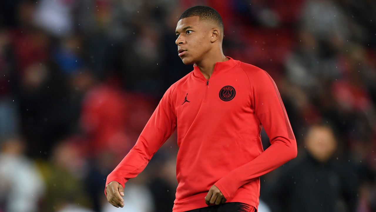 LIVERPOOL, ENGLAND - SEPTEMBER 18: Kylian Mbappe of Paris Saint-Germain warms up prior to the Group C match of the UEFA Champions League between Liverpool and Paris Saint-Germain at Anfield on September 18, 2018 in Liverpool, United Kingdom.
