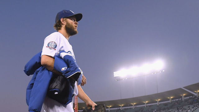 LOS ANGELES, CA - SEPTEMBER 18: Clayton Kershaw #22 of the Los Angeles Dodgers walks to the dugout before his start against the Colorado Rockies at Dodger Stadium on September 18, 2018 in Los Angeles, California.