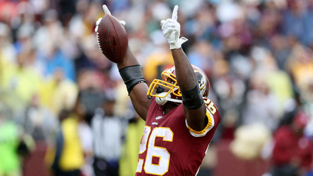 LANDOVER, MD - SEPTEMBER 23: Adrian Peterson #26 of the Washington Redskins celebrates after rushing for a first half touchdown against the Green Bay Packers at FedExField on September 23, 2018 in Landover, Maryland.