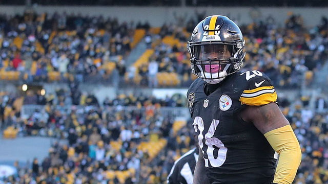 PITTSBURGH, PA - JANUARY 14: Le'Veon Bell #26 of the Pittsburgh Steelers reacts after rushing for an 8 yard touchdown in the fourth quarter during the AFC Divisional Playoff game at Heinz Field on January 14, 2018 in Pittsburgh, Pennsylvania.