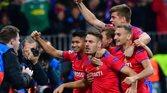 CSKA Moscow's Croatian midfielder Nikola Vlasic (C) celebrates with teammates after scoring the opening goal during the UEFA Champions League group G football match between PFC CSKA Moscow and Real Madrid CF at the Luzhniki stadium in Moscow on October 2, 2018.