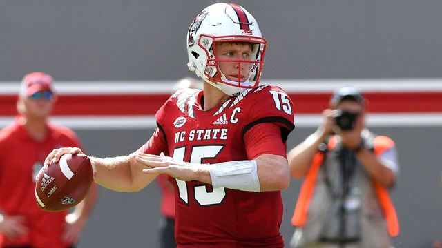 RALEIGH, NC - SEPTEMBER 29: Ryan Finley #15 of the North Carolina State Wolfpack drops back to pass against the Virginia Cavaliers at Carter-Finley Stadium on September 29, 2018 in Raleigh, North Carolina. NC State won 35-21.
