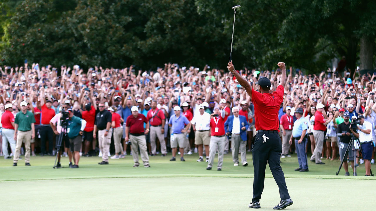 ATLANTA, GA - SEPTEMBER 23: Tiger Woods of the United States celebrates making a par on the 18th green to win the TOUR Championship at East Lake Golf Club on September 23, 2018 in Atlanta, Georgia.