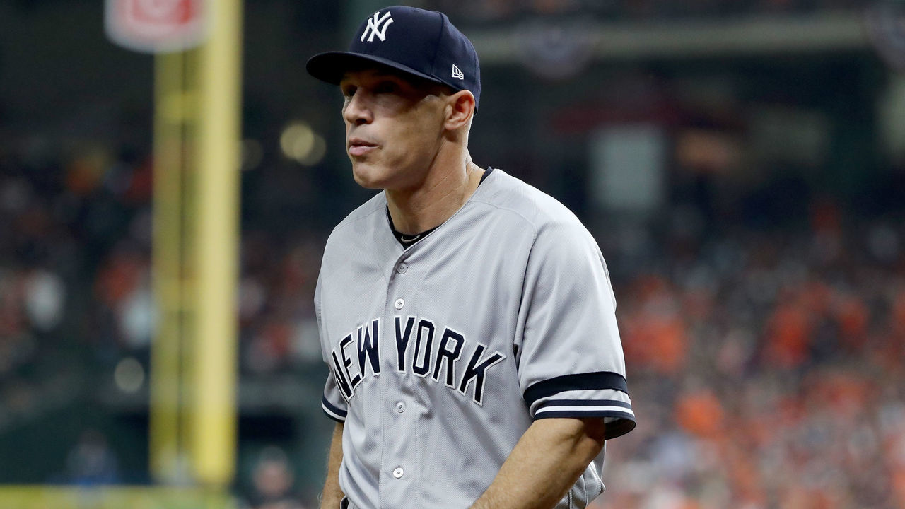 HOUSTON, TX - OCTOBER 21: Joe Girardi #28 of the New York Yankees walks back to the dugout against the Houston Astros during the second inning in Game Seven of the American League Championship Series at Minute Maid Park on October 21, 2017 in Houston, Texas.