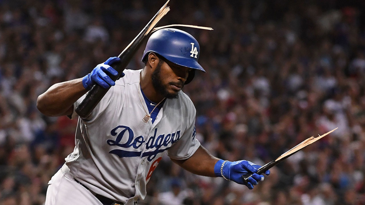 PHOENIX, AZ - SEPTEMBER 26: Yasiel Puig #66 of the Los Angeles Dodgers breaks his bat after popping out in the fifth inning of the MLB game against the Arizona Diamondbacks at Chase Field on September 26, 2018 in Phoenix, Arizona.