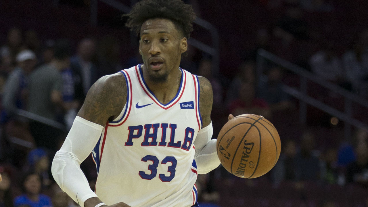PHILADELPHIA, PA - SEPTEMBER 28: Robert Covington #33 of the Philadelphia 76ers drives to the basket against Melbourne United in the preseason game at Wells Fargo Center on September 28, 2018 in Philadelphia, Pennsylvania.