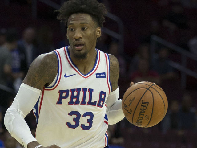 PHILADELPHIA, PA - SEPTEMBER 28: Robert Covington #33 of the Philadelphia 76ers drives to the basket against Melbourne United in the preseason game at Wells Fargo Center on September 28, 2018 in Philadelphia, Pennsylvania.
