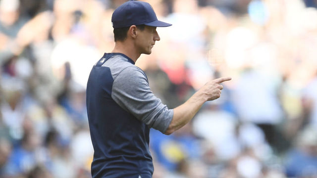 MILWAUKEE, WI - AUGUST 22: Head coach Craig Counsell #30 of the Milwaukee Brewers walks to the mound during the eighth inning of a game against the Cincinnati Reds at Miller Park on August 22, 2018 in Milwaukee, Wisconsin.