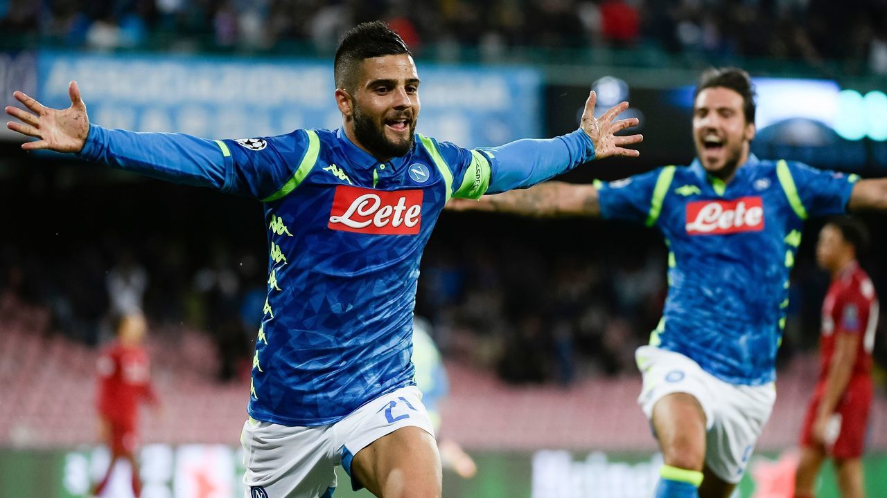 Napoli's Italian forward Lorenzo Insigne (L) celebrates scoring during the UEFA Champions League group C football match between Napoli and Liverpool on October 3, 2018 at the San Paolo stadium in Naples.