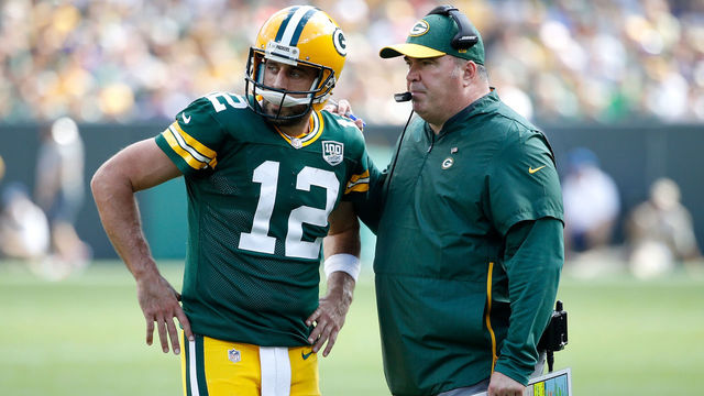 GREEN BAY, WI - SEPTEMBER 16: Aaron Rodgers #12 of the Green Bay Packers talks with head coach Mike McCarthy during the fourth quarter of a game against the Minnesota Vikings at Lambeau Field on September 16, 2018 in Green Bay, Wisconsin.