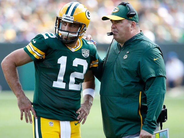 GREEN BAY, WI - SEPTEMBER 16: Aaron Rodgers #12 of the Green Bay Packers talks with head coach Mike McCarthy during the fourth quarter of a game against the Minnesota Vikings at Lambeau Field on September 16, 2018 in Green Bay, Wisconsin.