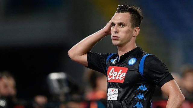 Napoli's Polish forward Arkadiusz Milik reacts during the Italian Serie A football match Lazio vs Napoli at the Olympic stadium in Rome on August 18, 2018.