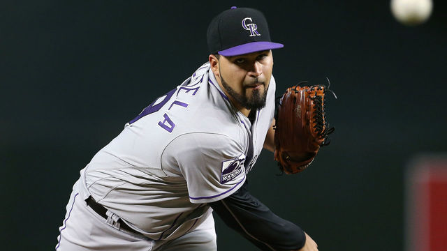 PHOENIX, AZ - SEPTEMBER 22: Antonio Senzatela #49 of the Colorado Rockies pitches against the Arizona Diamondbacks during the first inning of an MLB game at Chase Field on September 22, 2018 in Phoenix, Arizona.