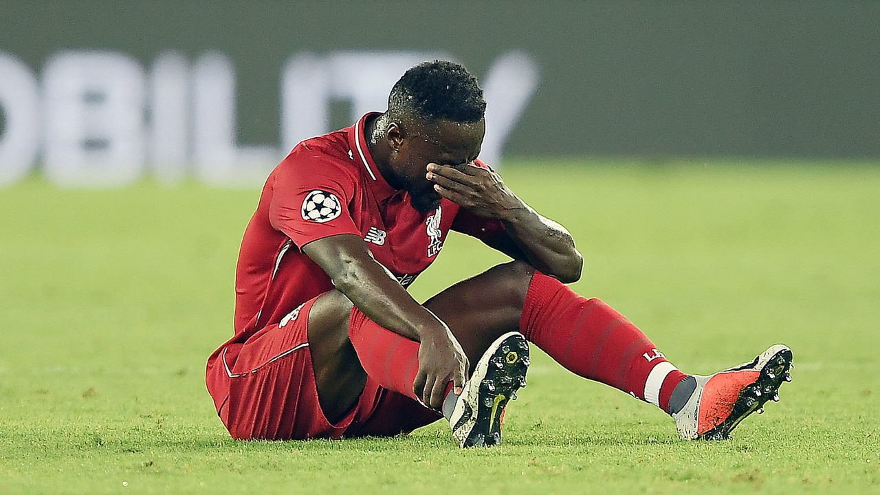 NAPLES, ITALY - OCTOBER 03: Naby Keita of Liverpool injured during the Group C match of the UEFA Champions League between SSC Napoli and Liverpool at Stadio San Paolo on October 3, 2018 in Naples, Italy.