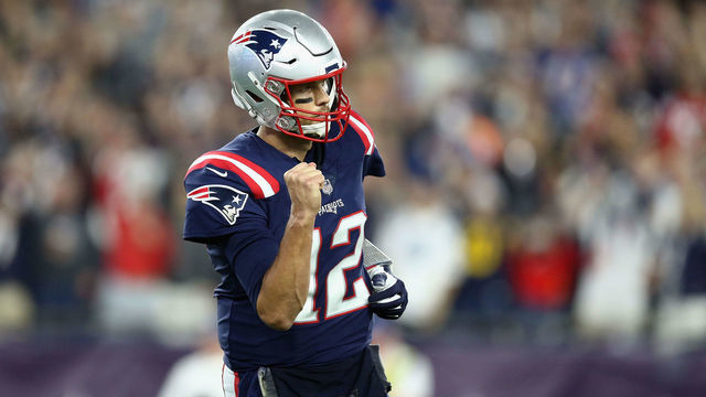 FOXBOROUGH, MA - OCTOBER 04: Tom Brady #12 of the New England Patriots celebrates after throwing a touchdown pass to Cordarrelle Patterson #84 (not pictured) during the first quarter against the Indianapolis Colts at Gillette Stadium on October 4, 2018 in Foxborough, Massachusetts.