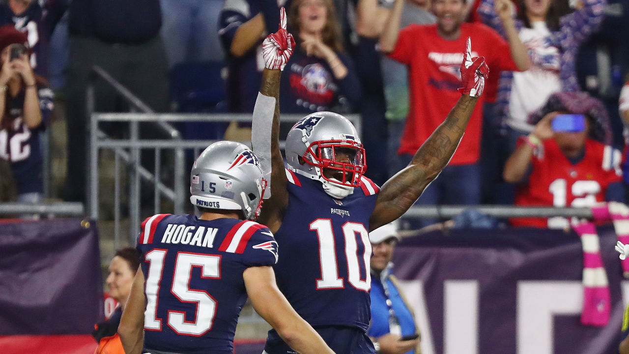 FOXBOROUGH, MA - OCTOBER 04: Josh Gordon #10 of the New England Patriots celebrates with Chris Hogan #15 after catching a touchdown pass from Tom Brady #12 (not pictured) during the fourth quarter against the Indianapolis Colts at Gillette Stadium on October 4, 2018 in Foxborough, Massachusetts. The touchdown completion to Gordon is Tom Brady's 500th career touchdown pass.