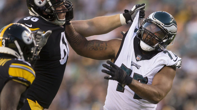 PHILADELPHIA, PA - AUGUST 09: Michael Bennett #77 of the Philadelphia Eagles rushes against Jake Rodgers #68 of the Pittsburgh Steelers in the second quarter during the preseason game at Lincoln Financial Field on August 9, 2018 in Philadelphia, Pennsylvania.