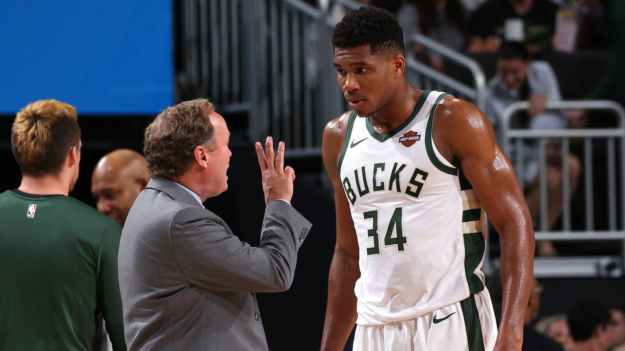 MILWAUKEE, WI - OCTOBER 3: Giannis Antetokounmpo #34 of the Milwaukee Bucks talks with Mike Budenholzer during the game against the Chicago Bulls during a pre-season game on October 3, 2018 at Fiserv Forum, in Milwaukee, Wisconsin. NOTE TO USER: User expressly acknowledges and agrees that, by downloading and/or using this Photograph, user is consenting to the terms and conditions of the Getty Images License Agreement. Mandatory Copyright Notice: Copyright 2018 NBAE