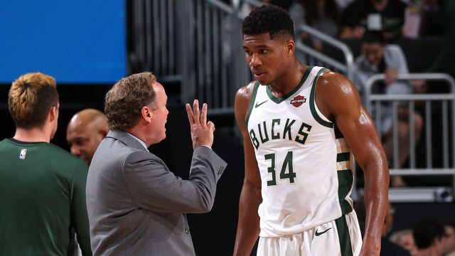 MILWAUKEE, WI - OCTOBER 3: Giannis Antetokounmpo #34 of the Milwaukee Bucks talks with Mike Budenholzer during the game against the Chicago Bulls during a pre-season game on October 3, 2018 at Fiserv Forum, in Milwaukee, Wisconsin. NOTE TO USER: User expressly acknowledges and agrees that, by downloading and/or using this Photograph, user is consenting to the terms and conditions of the Getty Images License Agreement. Mandatory Copyright Notice: Copyright 2018 NBAE