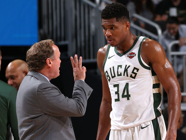 MILWAUKEE, WI - OCTOBER 3: Giannis Antetokounmpo #34 of the Milwaukee Bucks talks with Mike Budenholzer during the game against the Chicago Bulls during a pre-season game on October 3, 2018 at Fiserv Forum, in Milwaukee, Wisconsin. NOTE TO USER: User expressly acknowledges and agrees that, by downloading and/or using this Photograph, user is consenting to the terms and conditions of the Getty Images License Agreement. Mandatory Copyright Notice: Copyright 2018 NBAE